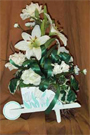 keepsake arrangement with white lilys, carnations and baby's breath