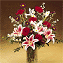 Vase arrangement with Carnations, Iris, Roses, Star Gazer 
Lilies