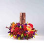 fall arrangement with autumn colored flowers such as mini Carnations, Daisy Pompons, Mini Lilies, Aster and Lilies.