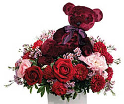  wildly romantic Teleflora floral gift with a keepsake sachet bear with a rose 	fragrance